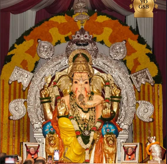 GSB Seva Mandal Ganpati idol adorned with gold and flower garlands at King's Circle, Mumbai