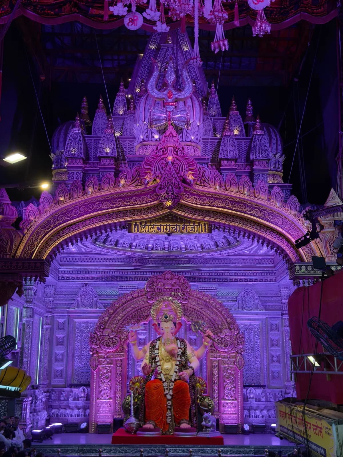 Ganpati idol and illuminated pandal decorations in Lalbaug, Mumbai